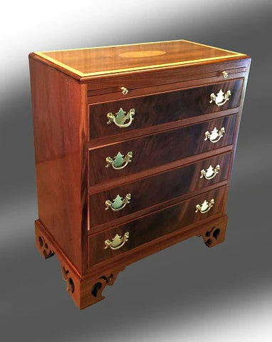antique dresser with four drawers and gold finishings